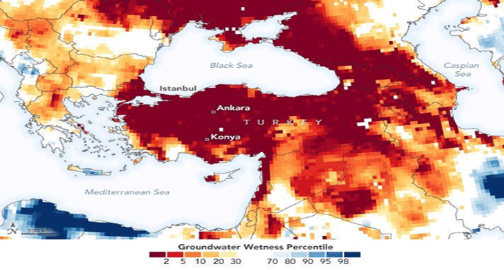 Satellite map of groundwater wetness over Türkiye and its neighbours, shaded by percentile. Most of central and eastern Türkiye — including the areas around Ankara and Konya — sits in the darkest band, at or below the second percentile, indicating severe groundwater depletion. Wetter areas appear only at the western and northern margins. The place names and the "Groundwater Wetness Percentile" legend are in English.